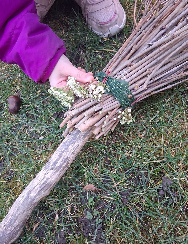 Child building with sticks and natural materials